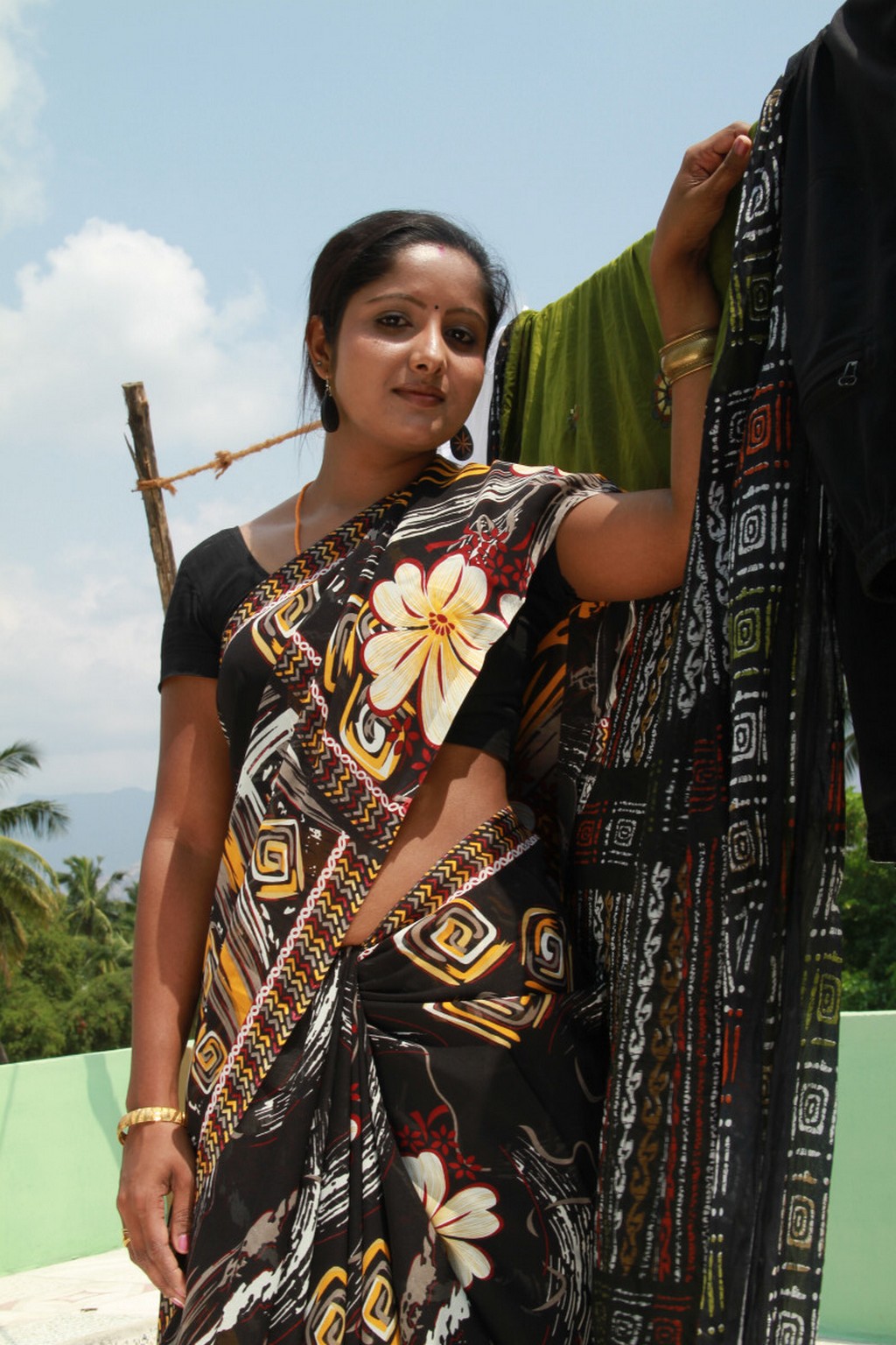 Madhuram Movie Hot Photos